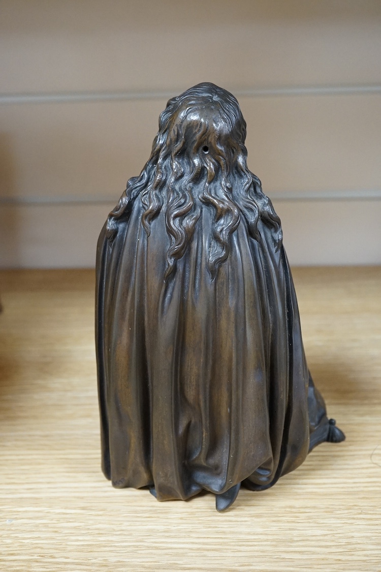 An early to mid 20th century bronze figure of Mary Magdalene kneeling, 20cm. Condition - good